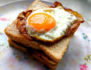 Fried egg on bread, outdoor Chiangmai Thailand.