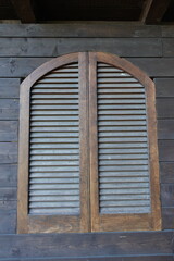 old wooden window with shutters