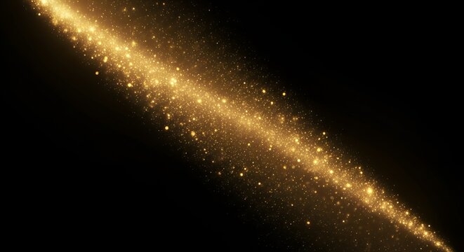 Golden glitter sparkle trail isolated on black background for festive concept