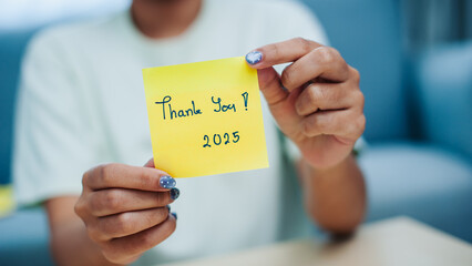 Gratitude gesture with sticky notes home office personal message cozy environment close-up viewpoint
