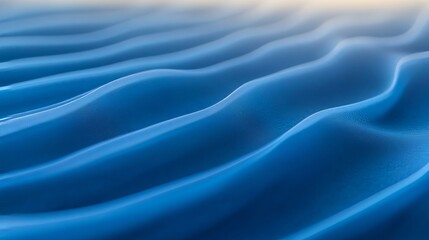 Captivating abstract blue waves creating a serene, flowing motion perfect for modern design backgrounds and calming visuals.