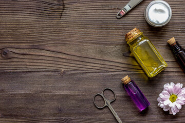 care of nails and cuticle on wooden background top view