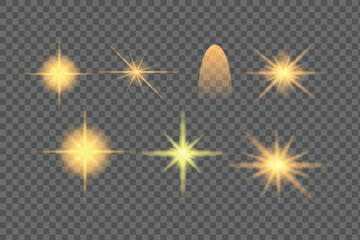 Vector art of set of golden light flares and starbursts on transparent background