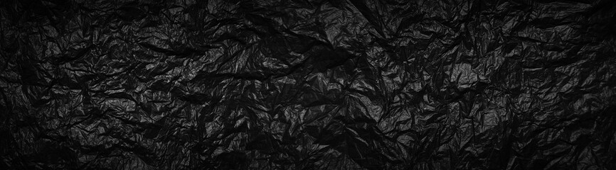 Black garbage bag texture background with copy space