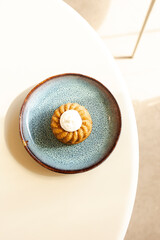 Mini bundt cake with frosting on plate