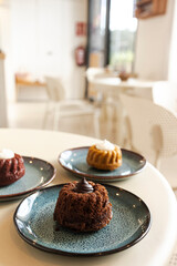 Chocolate mini bundt cakes and sweet pastries in cafe