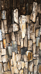 Closeup of Rustic Wood Log Wall with Natural Texture and Earth Tones for Interior Design and Architectural Use