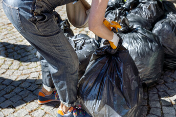 Volunteers collecting garbage from the city streets