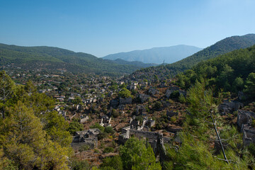 Fethiye Kayak&ouml;y stone houses and ruins. Mugla, Turkey. Kayakoy ghost village. Turkey's abandoned houses. The Ghost Town of Kayakoy. Abandoned religious ghost city.