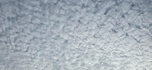 Blue sky covered with white clouds