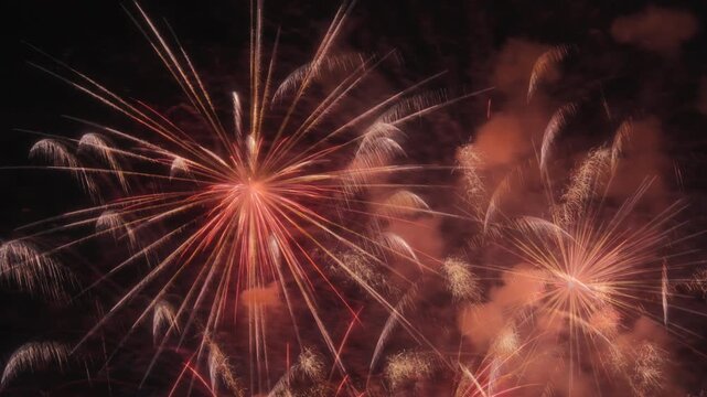 Abstract close up of exploding fireworks at night. Long exposure