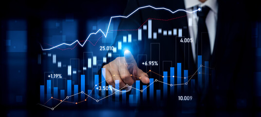 A businessman engaging with digital financial graphs that illustrate market trends and data analysis, symbolizing growth and successful investment strategies in a sleek office space. Scalp