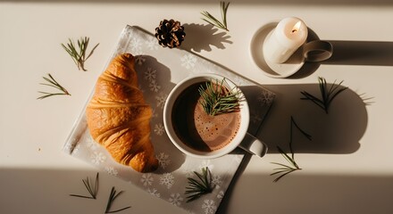 Minimalist Festive Breakfast Flatlay with Croissants, Cocoa Mug, Pine Sprig, Candle, Snowflake Pattern Napkin, Neutral Beige Tones, Natural Daylight Shadows