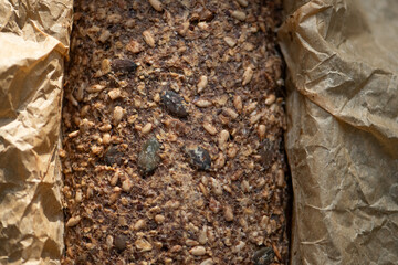 Gluten-free homemade bread with mixed grains and seeds, healthy breakfast concept