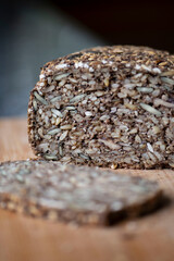 Gluten-free homemade bread with mixed grains and seeds, healthy breakfast concept