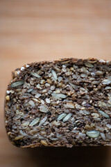 Gluten-free homemade bread with mixed grains and seeds, healthy breakfast concept