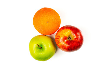 Fresh green apple, orange, and red apple arranged on a white background, showing vibrant color contrast for healthy lifestyle concept