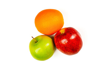 Fresh green apple, orange, and red apple arranged on a white background, showing vibrant color contrast for healthy lifestyle concept