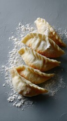 Golden crescent dumplings rest on a floury slate, evoking Eastern European traditions, comforting winter solstice gatherings