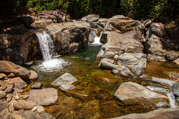 Tukuran Falls. Set in the jungle, this natural attraction features gentle waterfalls and areas for swimming. Puerto Galera, Oriental Mindoro, Philippines