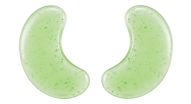 Pair of curved light green gel eye patches with small flecks isolated on black gel patch eye care skincare beauty cosmetic clear translucent particles