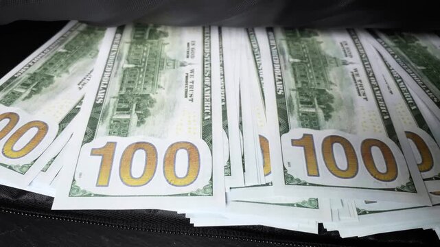 Bag with money. Bribe concept. American banknotes in case