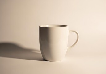 Simple White Ceramic Coffee Mug with Dramatic Shadow on Pale Background
