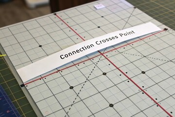 Grid diagram with a note showing connection crosses point