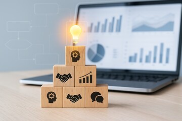 Wooden blocks pyramid with light bulb and business icons showing leadership innovation strategy teamwork growth concept creativity management and success planning idea.