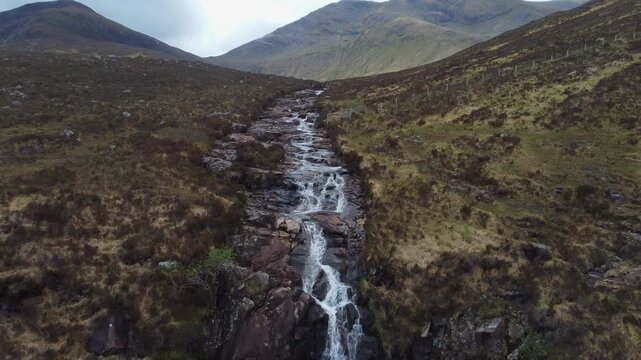 Scenic aerial view of Eas a'Bhradain Waterfall in Scotland