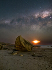 The Milky Way in the southern hemisphere, setting over the peaceful ocean.

