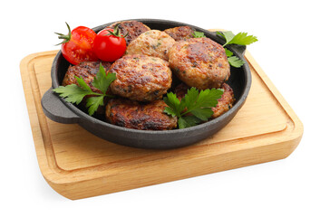 Delicious patties with parsley and tomatoes in pan isolated on white