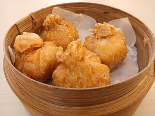 dim sum dumpling on bamboo wooden basket bowl