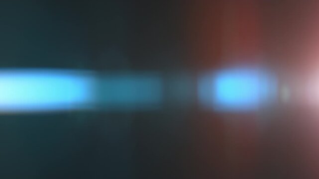 Real Shooted Anamorphic Lens Flare Transition on Black Background in Super Slow Motion.
