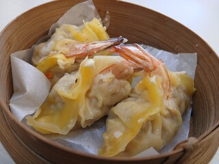 dim sum dumpling on bamboo wooden basket bowl