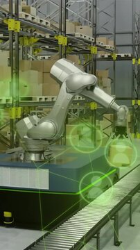 Robotic arm sorting packages in warehouse with green holographic icons animation