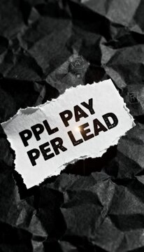 Business concept of PPL (Pay Per Lead) advertising model shown with text on ripped paper on a dark crumpled background.