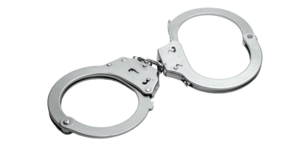 Polished metal handcuffs sit against black backdrop, with curved shapes reflecting light, and clear detail on the mechanism