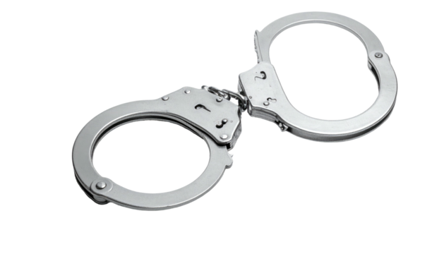 Polished metal handcuffs sit against black backdrop, with curved shapes reflecting light, and clear detail on the mechanism