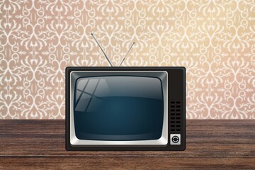 Vintage TV on antique closet in a home.