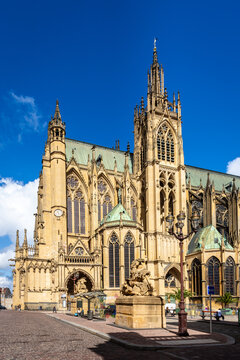 Metz, France - September 5, 2025: Southern facade of Saint Stephen cathedral of gothic style, achieved in 1552 and listed historical monument since 1930, seen from the Place d'Armes square.