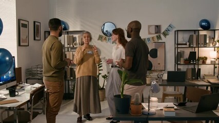 Senior Caucasian female manager moved by kind words on her retirement day in office, thanking and hugging her young colleagues