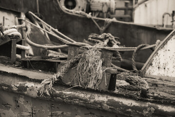 sunken and broken ships in a destroyed port in Ukraine during the war