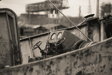 sunken and broken ships in a destroyed port in Ukraine during the war