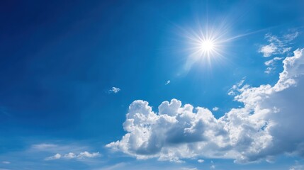Bright blue sky with sunlight and fluffy white clouds nature background