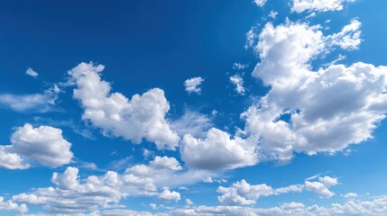 Bright blue sky with fluffy white clouds nature background sunlight