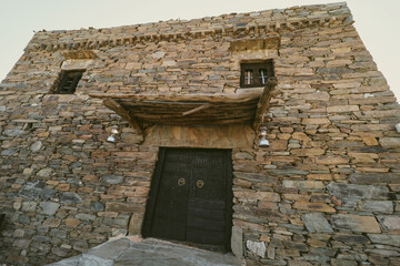 Al baha city ,Aseer Province , Saudi Arabia - September 12, 2022: beautiful historical stone building at Al Malad castle