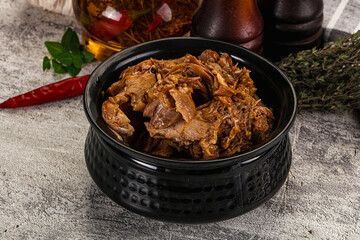 Shredded slow cooked pork meat