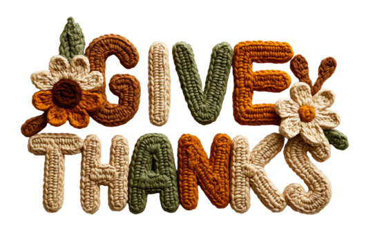 Give thanks text made from crocheted knitted yarn letters in autumn fall colors with handmade flower decorations on transparent background for thanksgiving holiday greeting.
