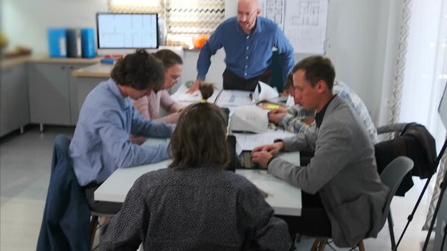 active team problemsolving, collaborative engineering problem resolution, intense teamwork addressing engineering challenges swiftly, urgent engineering team collaborates intensively to solve problems